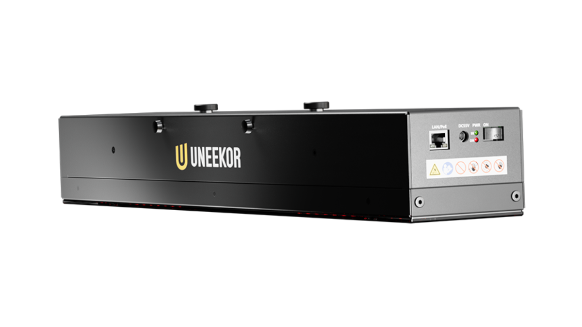 Rear mounted golf simulator launch monitor positioned out of hitting zone and behind the golfer.