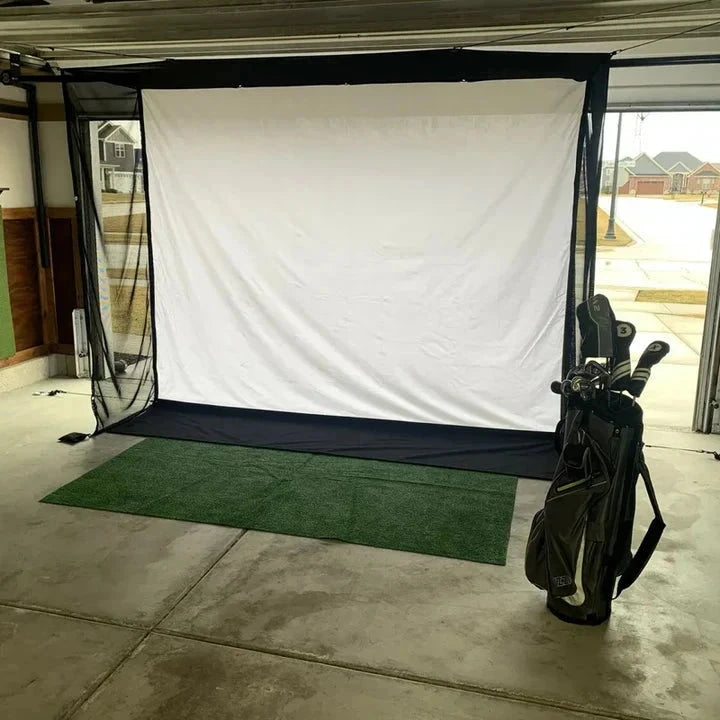 Retractable garage golf simulator impact screen with netting.