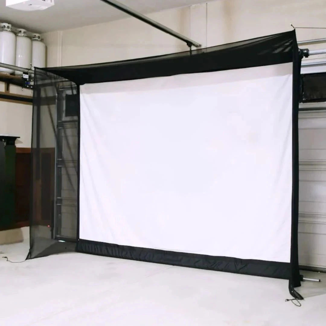 Retractable garage golf simulator impact screen with netting.