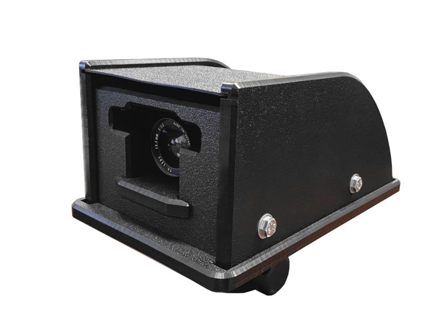 Introducing the Rugged Video Camera Shield Enclosure from AllSportSystems, featuring a black, box-shaped design with a visible lens. It's mounted securely on a bolted base, making it perfect for capturing your golf swing and an ideal choice for any AllSportSystems enthusiast.