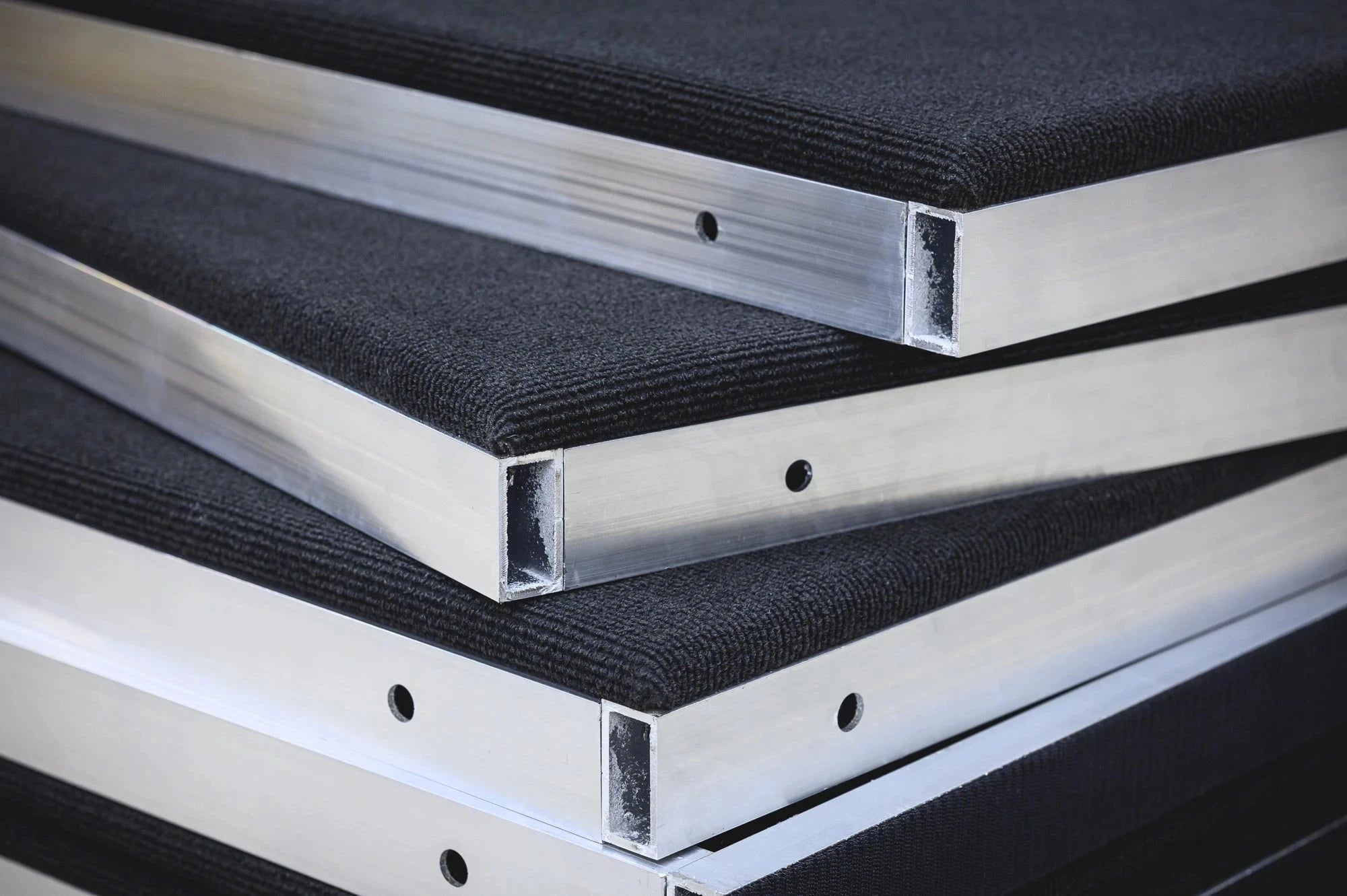 High end home golf simulator bays and enclosures with full golf flooring and solid side walls from SimBooth.