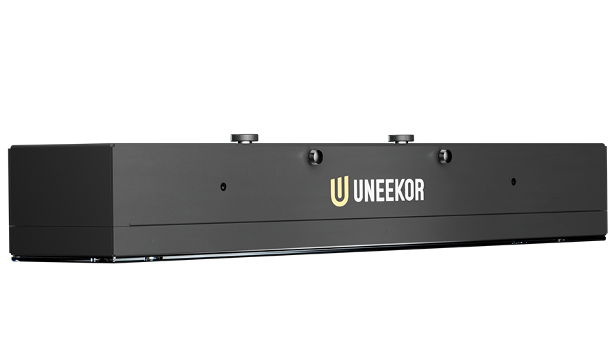 Uneekor EYE XR rear mounted golf launch monitor with a sleek, minimalist design, positioned out of the hitting zone to protect from errant shots.