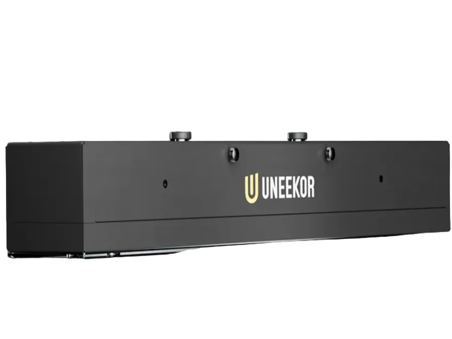 Uneekor EYE XR rear mounted golf launch monitor with a sleek, minimalist design, positioned out of the hitting zone to protect from errant shots.