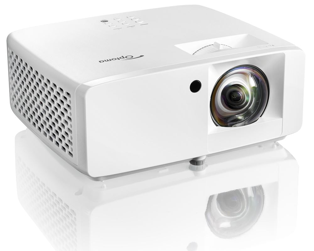 A white Fast Bundle 1080p projector from the Best Garmin R10 Golf Simulator Kit with controls on top and a lens on the front, placed on a reflective surface.