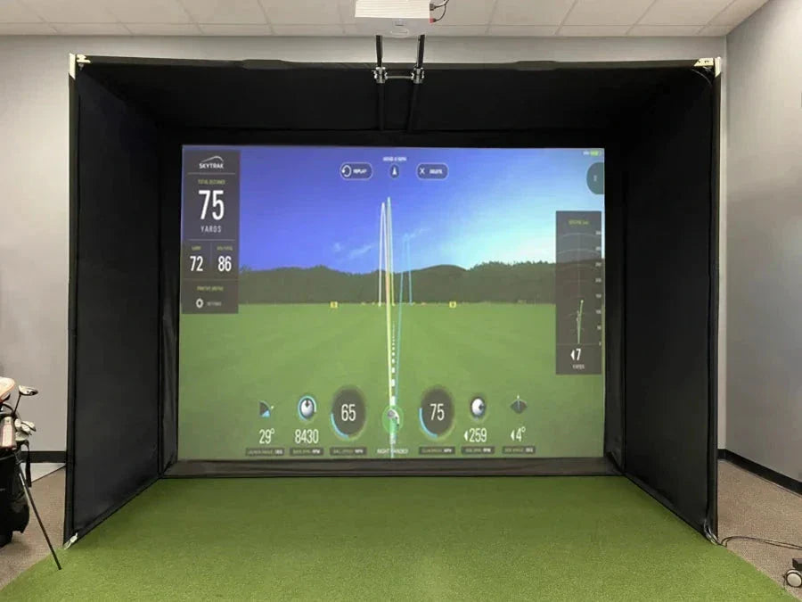 Fast Bundle's Low Cost Full Swing Golf KIT Indoor Simulator presents a driving range with detailed data on distance, speed, and angles. The DIY 4:3 BAY setup offers yardage and trajectory info on a screen above indoor artificial turf.