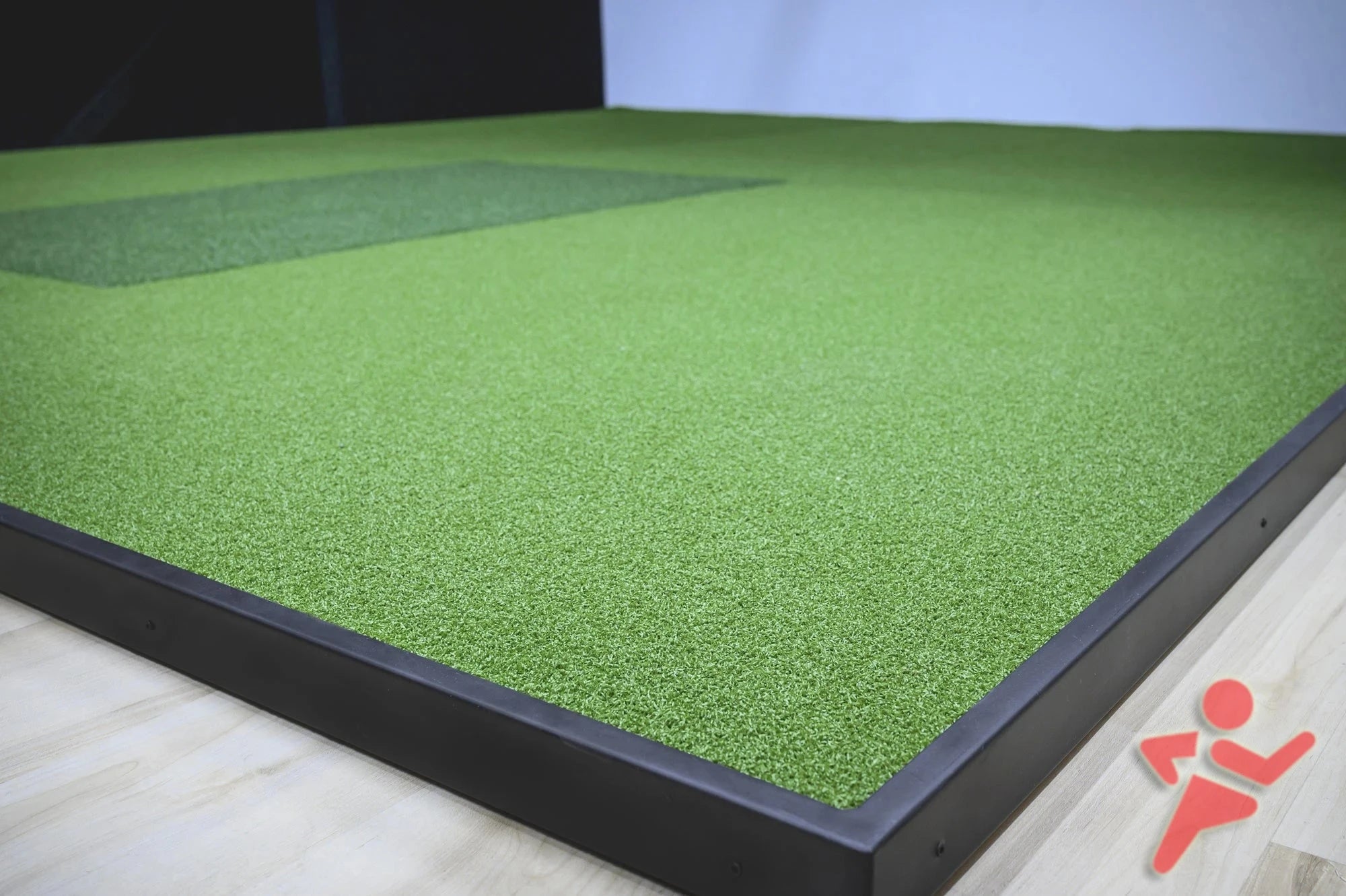 High end home golf simulator bays and enclosures with full golf flooring and solid side walls from SimBooth.