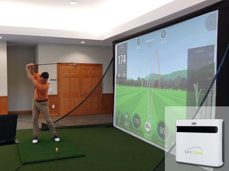 A complete Skytrak+ Home Golf Simulator Package with the MicroBay golf enclosure for small rooms.